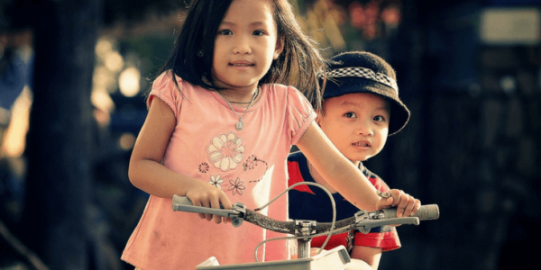 Cute Kids on Bicycle Slider