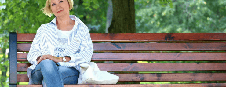 Woman enjoying day on park bench | Active Adult Lifestyle
